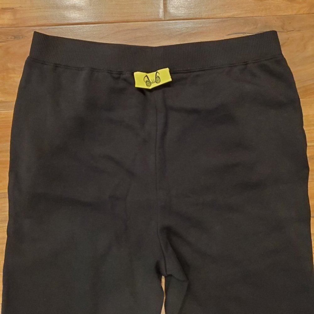NWOT Disney Villains x Heidi Klum Cruella Swirl Eyes Jogging Pants S - Picture 8 of 9